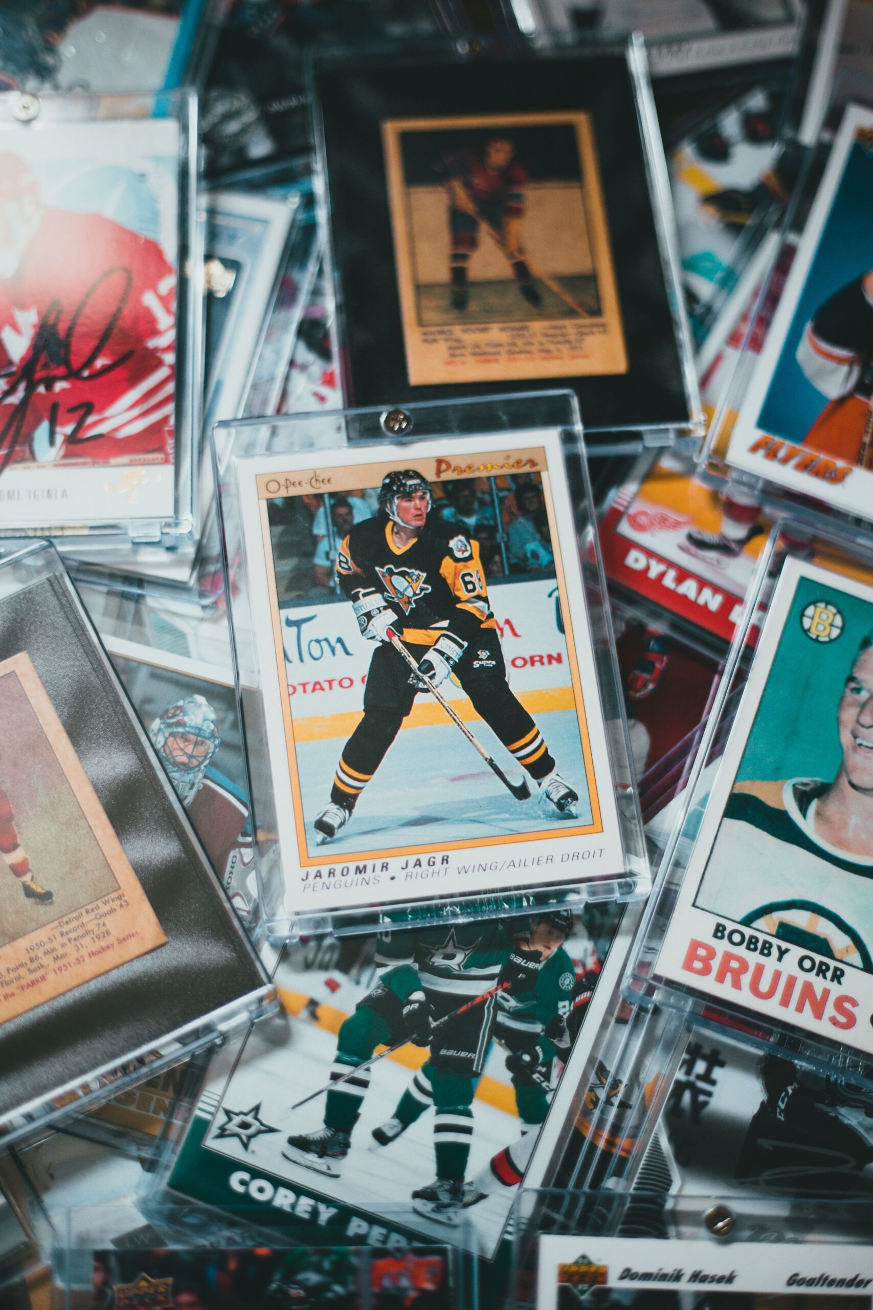 A collection of vintage hockey trading cards featuring famous players, great for sports collectors.